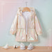 Kinderregenjacke mit Kapuze und Glanzoptik – Reißverschluss, Bündchen | Regenjacke