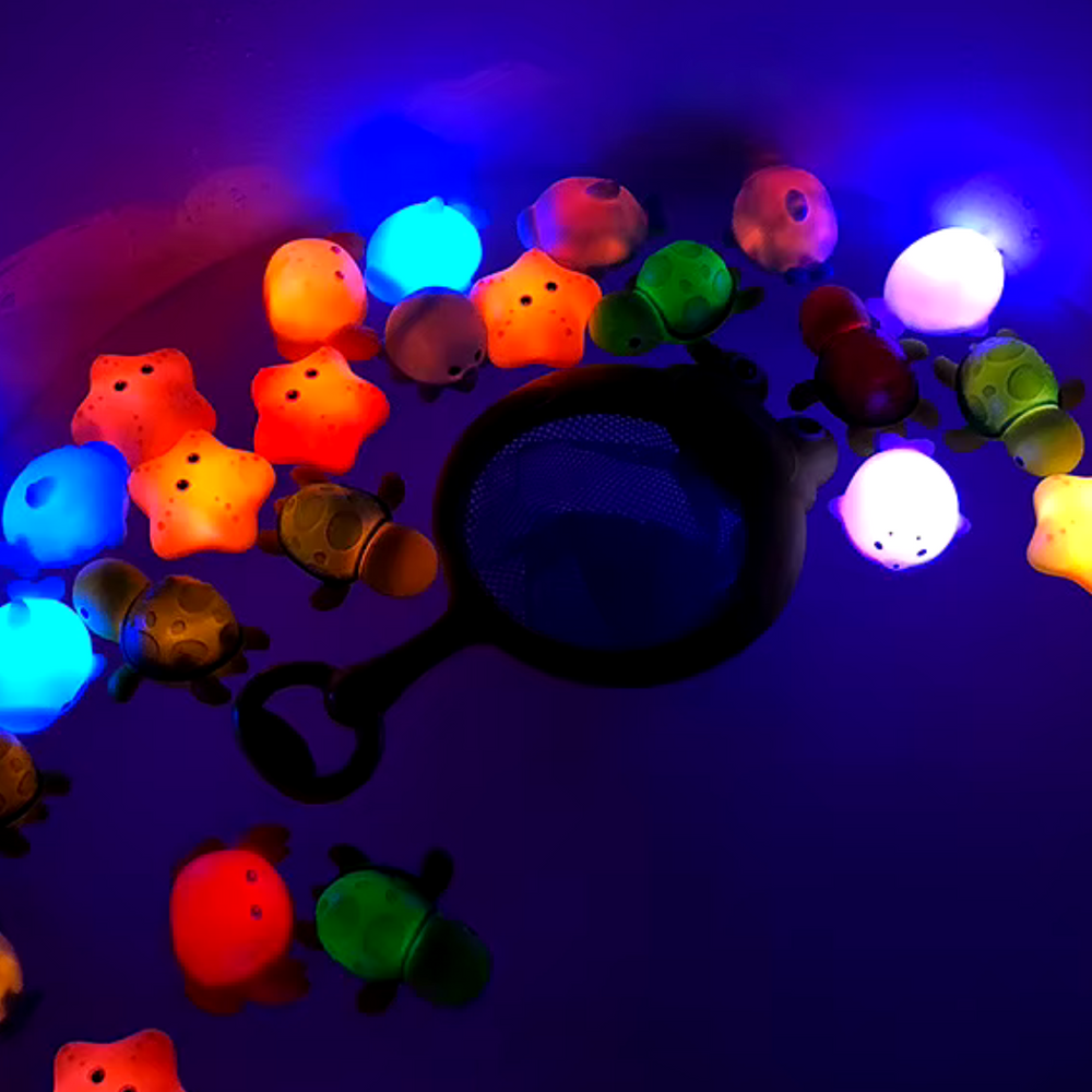 Leuchtendes Badespielzeug für Kinder – Kescher & LED-Wassertierchen – Magischer Spielspaß in Bad oder Pool