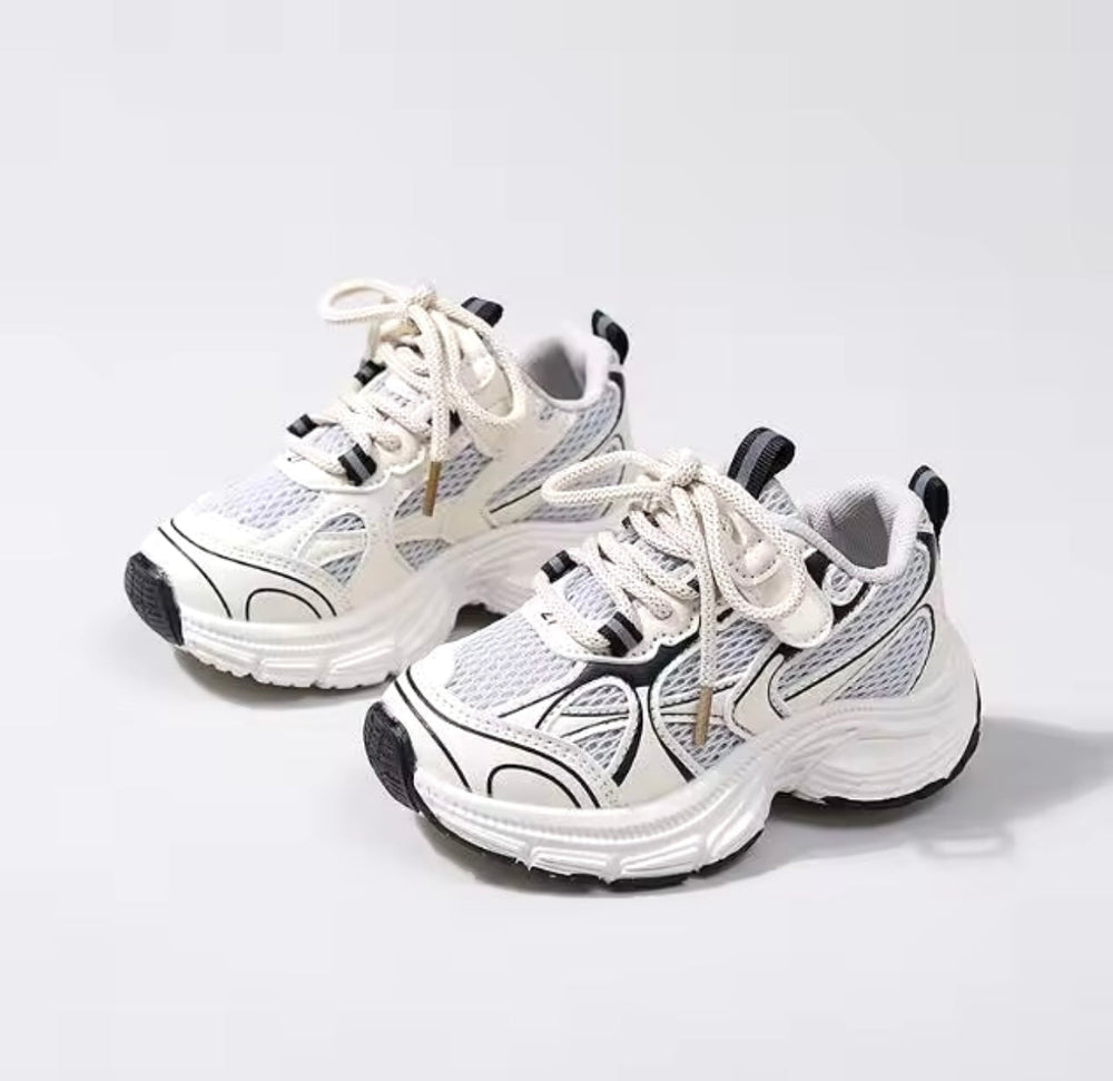 Schwarz-weiße Kindersneakers ohne Schnürsenkel – Größe 26-33 | Leicht & Atmungsaktiv | Unisex Sportschuhe