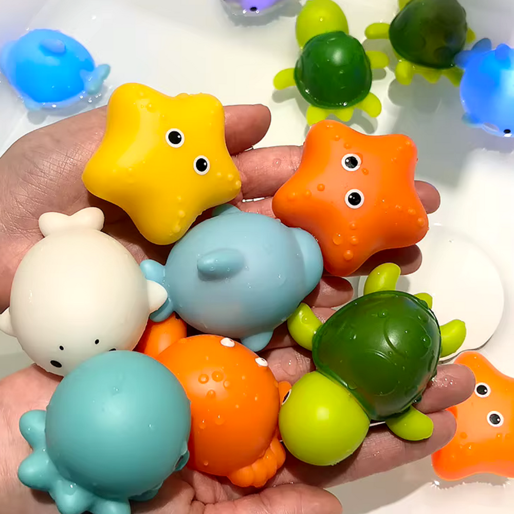 Leuchtendes Badespielzeug für Kinder – Kescher & LED-Wassertierchen – Magischer Spielspaß in Bad oder Pool